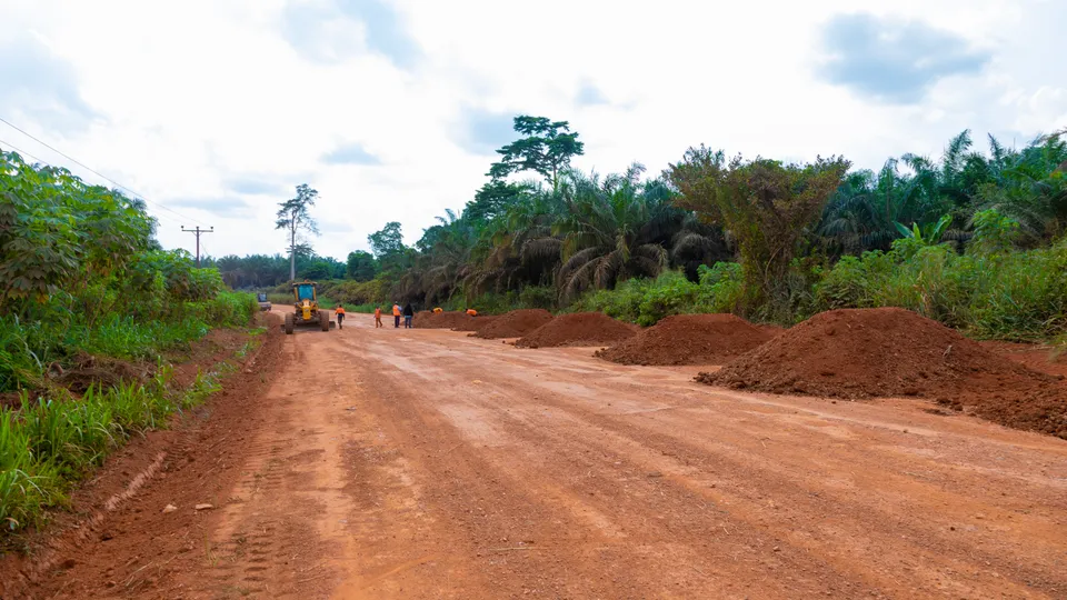 Road formation under construction through farmland