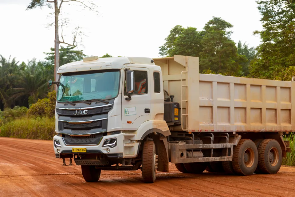 Propbureau tipper truck on a laterite road